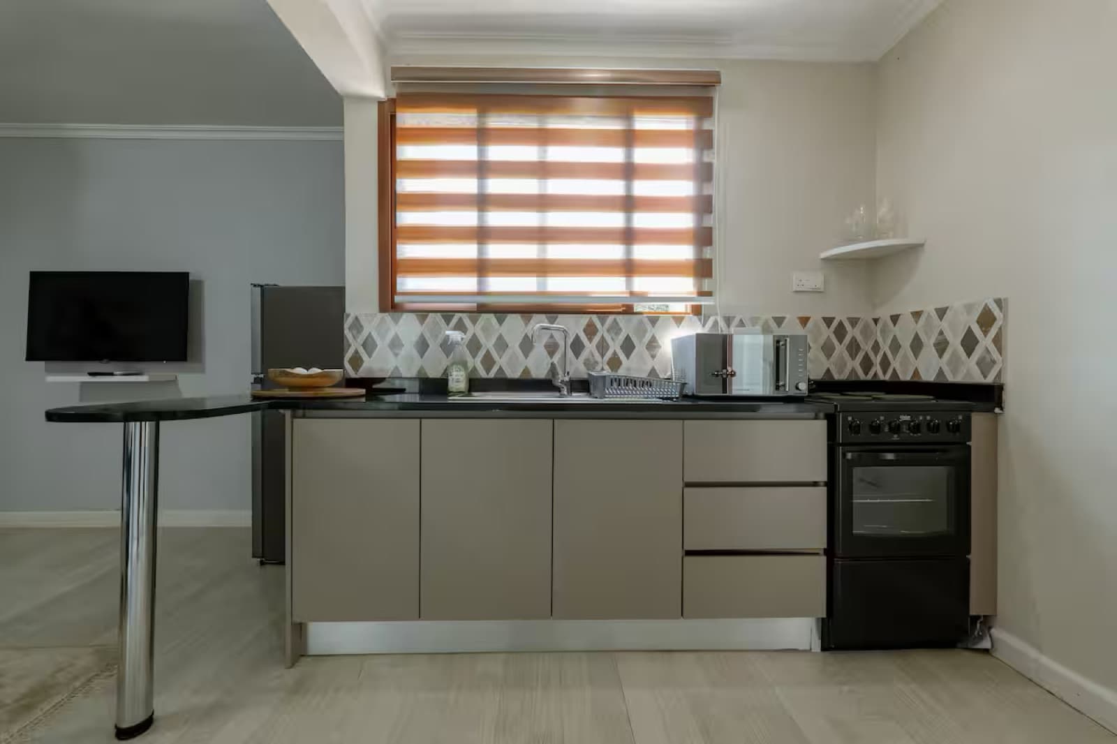 Studio Two — open-plan studio with kitchenette and lounge