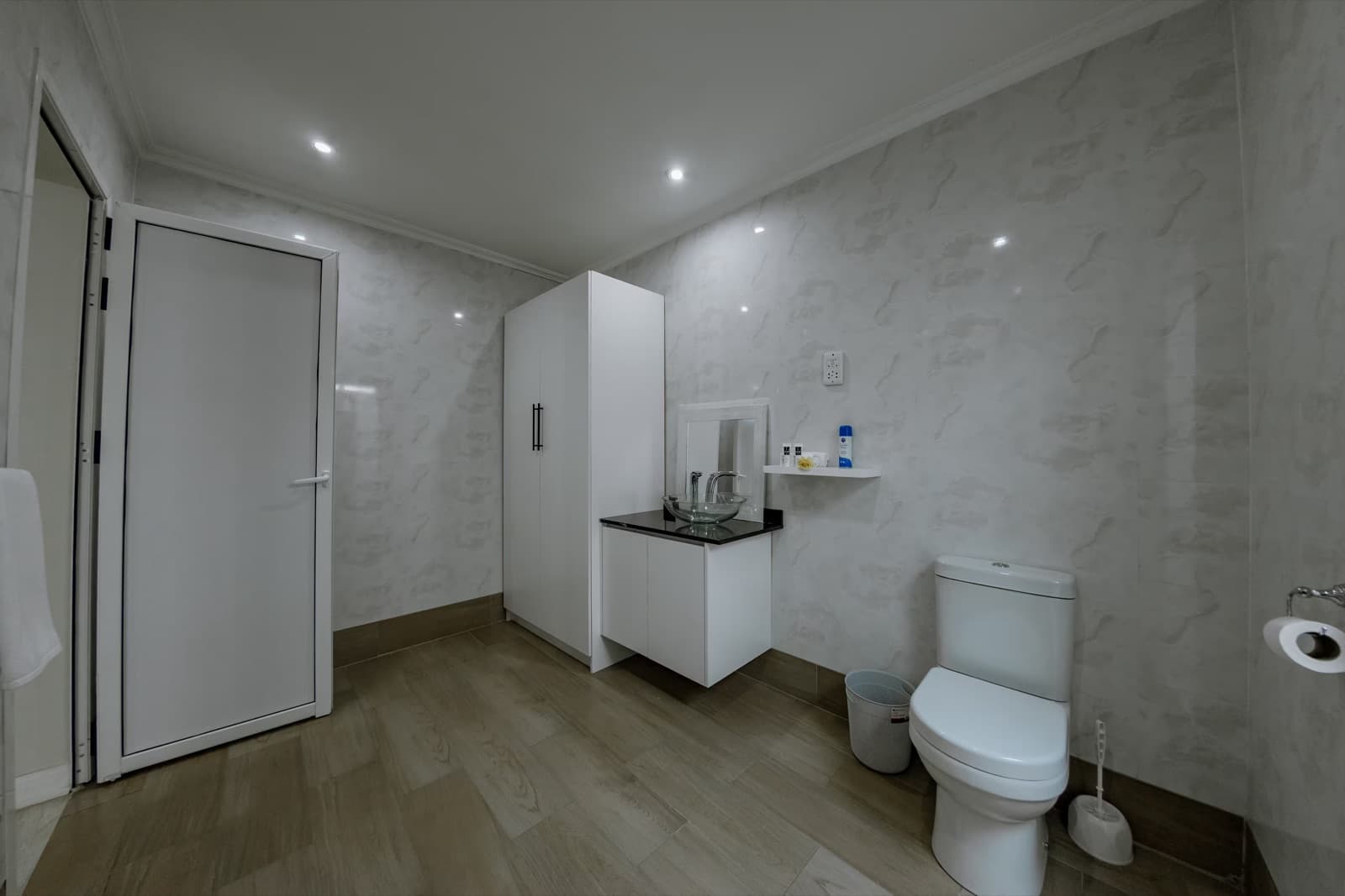 Bathroom with built-in wardrobe and vanity